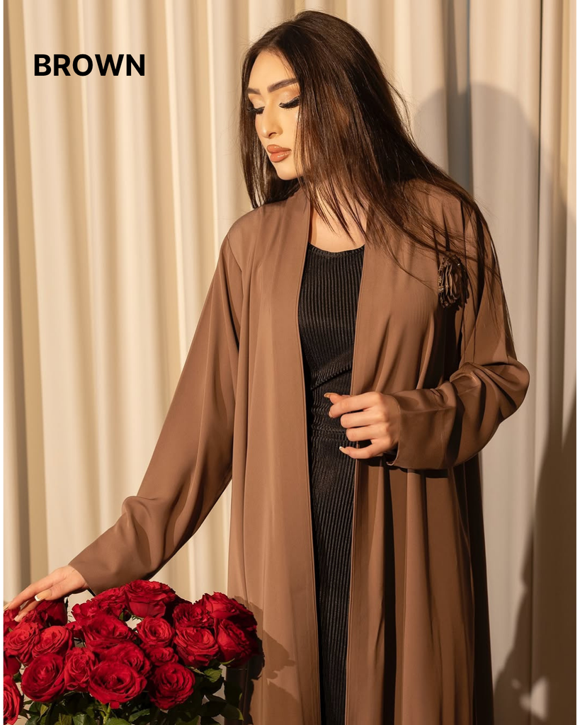 Text Overlay on Pink & Blue Abayas (1).png