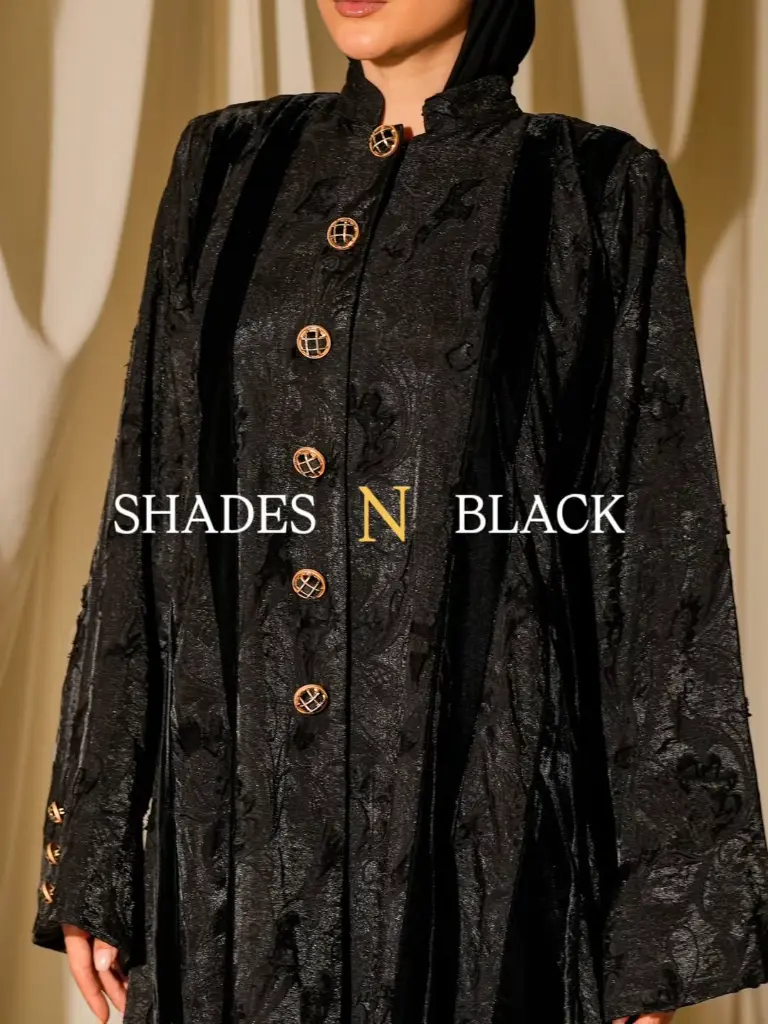Minimal Luxe AbayaClean lines, soft velvet texture — understated sophistication.Price 1100 QR.webp