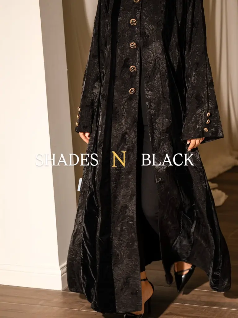 Minimal Luxe AbayaClean lines, soft velvet texture — understated sophistication.Price 1100 QR (1).webp