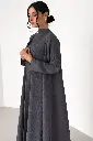 Serene elegance in a grey abaya.webp