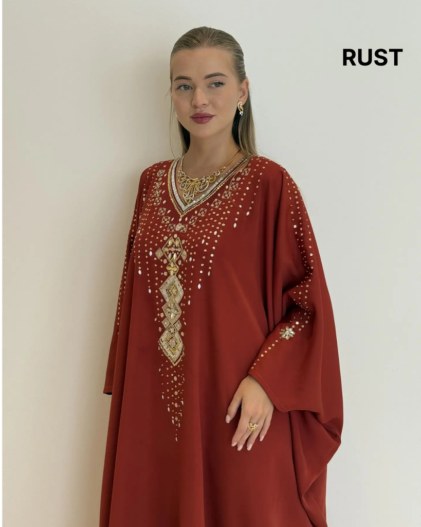 Text Overlay on Pink & Blue Abayas (22).png